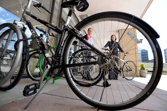 EHREN GAGG AND KAREN HILL NEAR GENSLER'S BIKE RACK