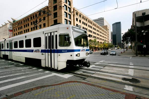 The light rail travels through downtown - Arianne Teeple