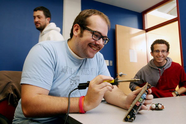 Mark Houston works on a project during Hackathon - Arianne Teeple