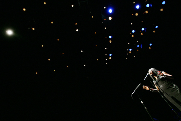 A Stoop Storyteller during the First Times Stories show at Centerstage