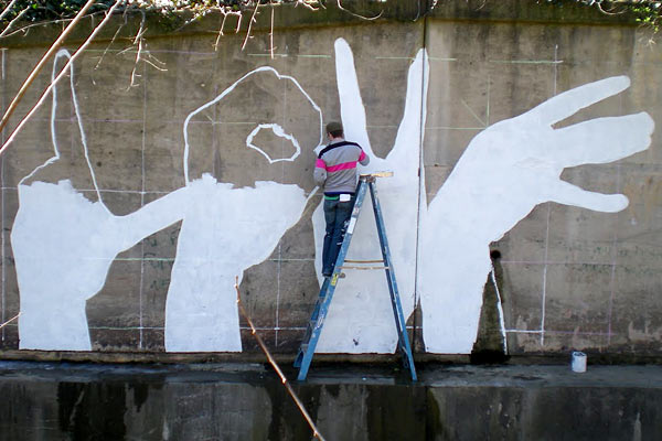 Artist Michael Owen painted his first Baltimore Love Project mural in Mount Washington